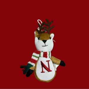🦌Small reindeer w/scarf plush keychain with an “N” initial on the front.